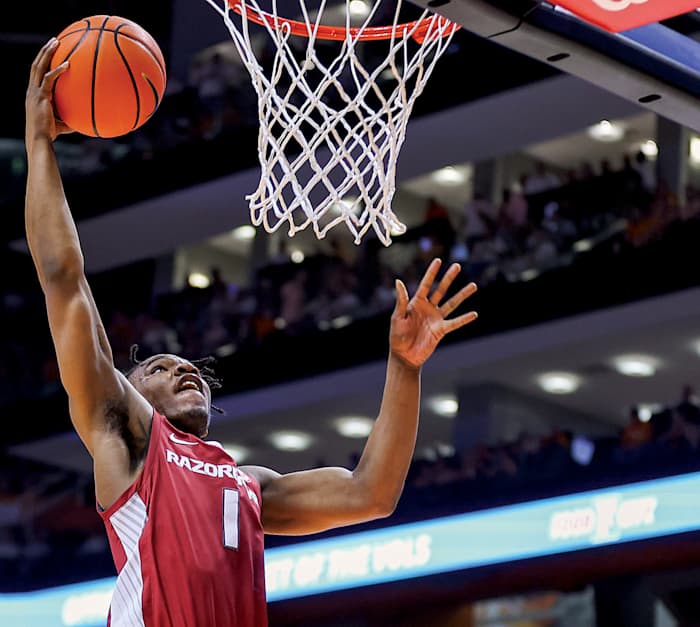 Arkansas Razorbacks guard JD Notae (1) goes to the basket against the Tennessee Volunteers during the second half at Thompson-Boling Arena.